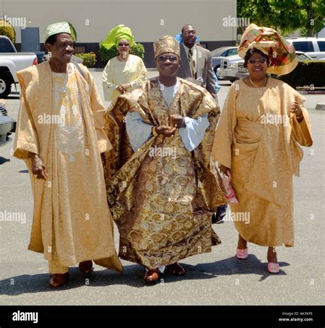 Dressed in the ceremonial robes of the Yoruba Tribe of Nigeria guests ...