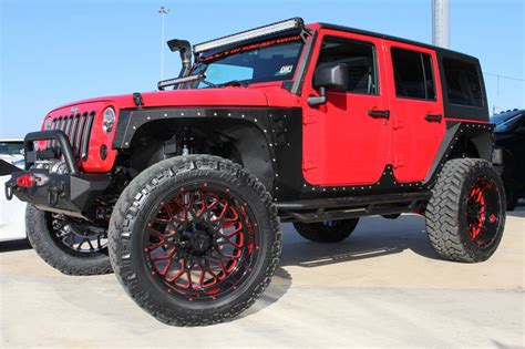 Red Jeep Wrangler With Red Rims