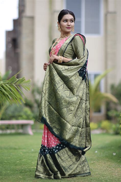 Gajari and green color bandhej silk saree with zari weaving work