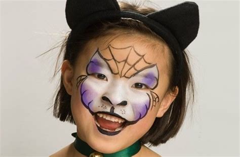 Halloween cat face paint | Face painting halloween, Face painting, Face ...