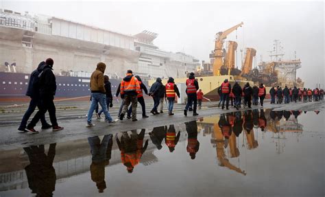 French strike disrupts power supply, petrol deliveries | Reuters