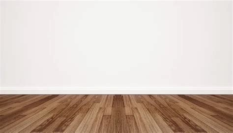 Hardwood floor with white wall Stock Photo by ©SasinP. 83936314