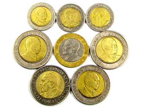 COLLECTION 8 BI METALIC COINS KENYA J 1569