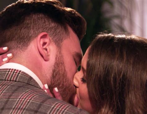 Kiss, Kiss! Travis Kelce Gets a Steamy, Surprise Smooch From a ...