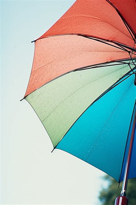 Rainbow Umbrella In The Rain Background Wallpaper Image For Free ...