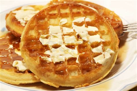 Stack of waffles with butter and syrup | Stock image | Colourbox