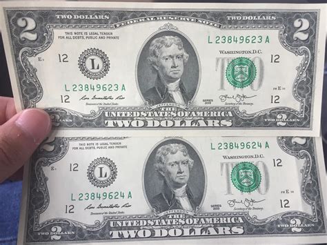 Randomly got given two 2 dollar bills with consecutive serial numbers as change : r ...