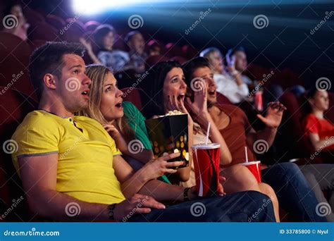 Audience Shocked In Multiplex Movie Theater Stock Photo - Image: 33785800