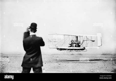 Wright Model A aircraft flight, 1909. US aviation pioneer Wilbur Wright ...