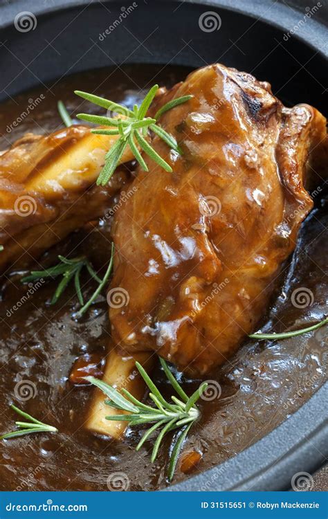 Lamb Shanks in Gravy stock image. Image of vertical, food - 31515651