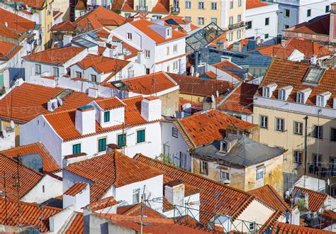 Portugal, Streets of Lisbon and city skyline seen from Alfama lookout ...