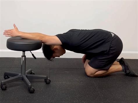 Lat Chair Stretch — Rehab Hero