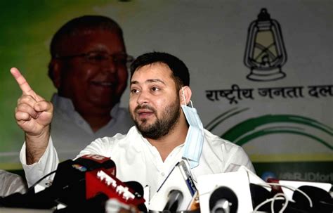 RJD leader Tejashwi Yadav addresses a press conference