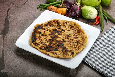 Indian cuisine stuffed Aloo paratha 36240364 Stock Photo at Vecteezy