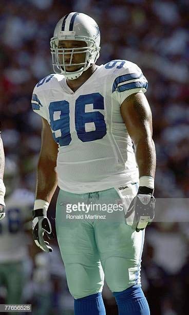 Marcus Spears of the Dallas Cowboys looks on the field during the game ...