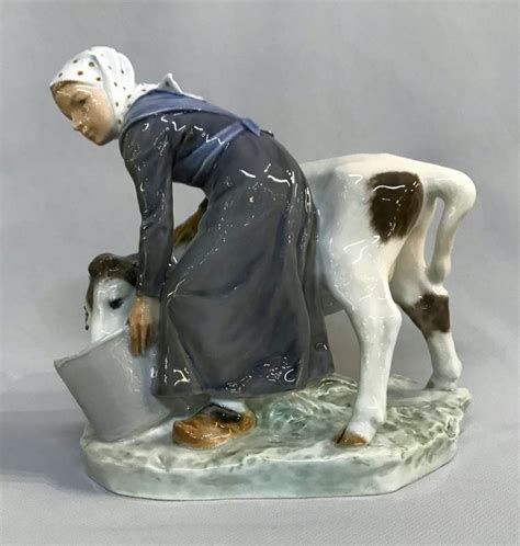 Vintage Royal Copenhagen figurine “Girl With Calf”