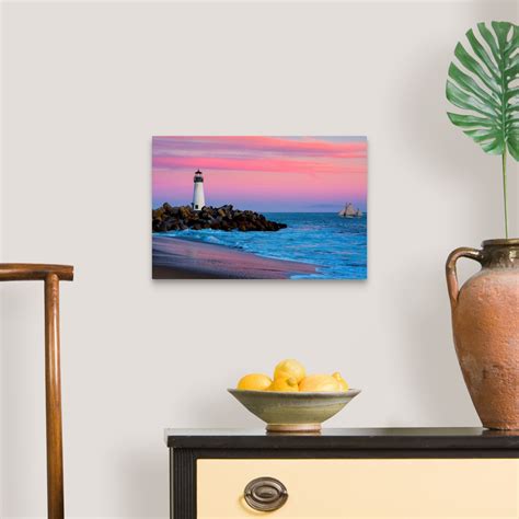 Santa Cruz Breakwater Lighthouse in Santa Cruz, California at sunset Wall Art, Canvas Prints ...