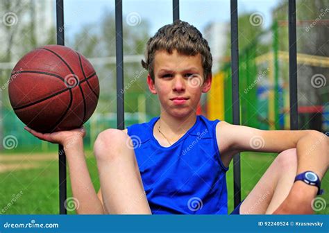 Kid with a Basketball at the Sport Court Stock Photo - Image of male, portrait: 92240524