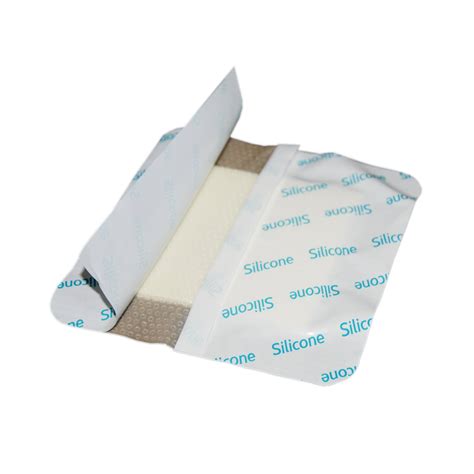 Silicone wound dressing polyurethane foam with soft silicone dressing