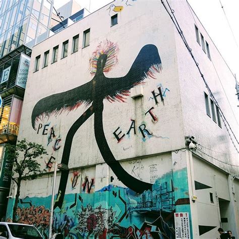 "Peace on Earth" street art mural in Amerikamura (America village ...