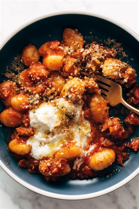 Millionaire Gnocchi with Red Sauce, Herbed Ricotta, and Golden Crispies Recipe - Pinch of Yum