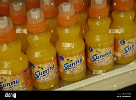 Sunny Delight produced by Sunny Delight Beverages displayed on shelves in a supermarket Stock ...