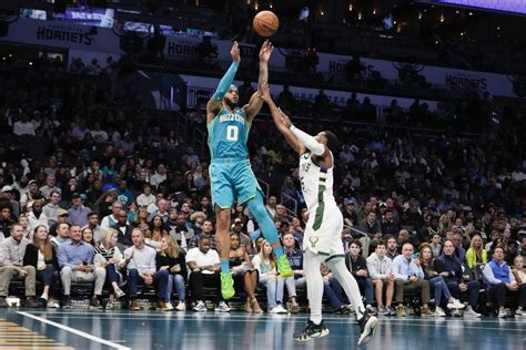 Bucks Defeat Hornets in Miles Bridges' Season Debut - Sports ...