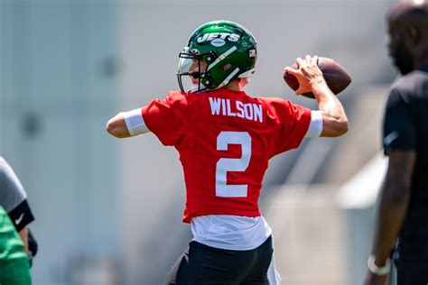 New York Jets QB Zach Wilson signs rookie deal after training camp ...