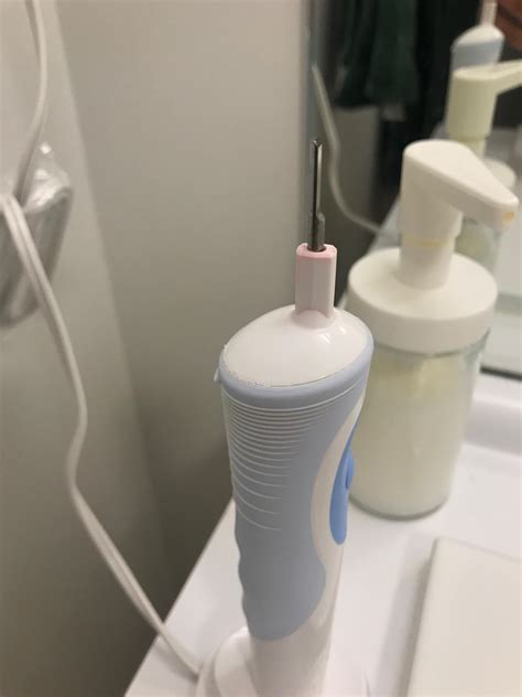 Red stains on electric toothbrush : CleaningTips