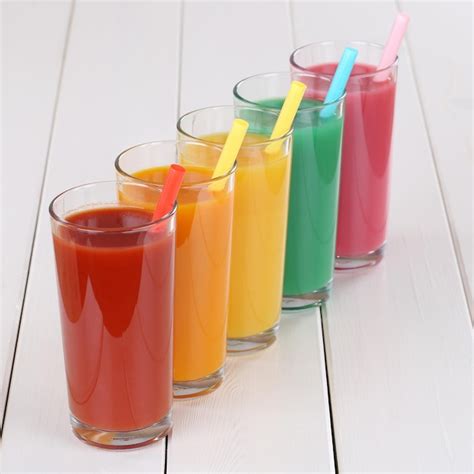 Premium Photo | Smoothies colorful fruit orange juice