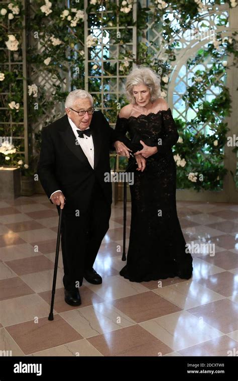 Henry Kissinger and wife Nancy arriving in the “Booksellers Area” of ...