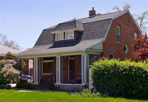 Gambrel Roof House with Brick Siding | RoofCalc.org