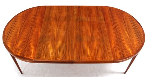 Danish Mid-Century Modern Round Teak Dining Table with Two Leaves at 1stDibs