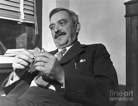 Earl Browder Holding His Glasses Photograph by Bettmann - Fine Art America