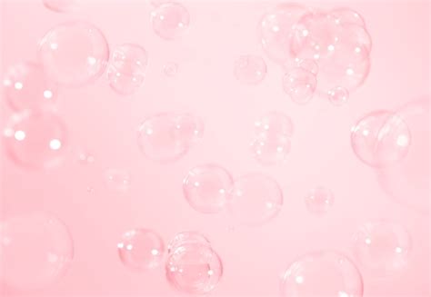 Premium Photo | Pink soap bubbles background.