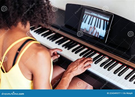 Piano Online Learning of an African Young Woman Stock Image - Image of internet, keyboard: 224349377