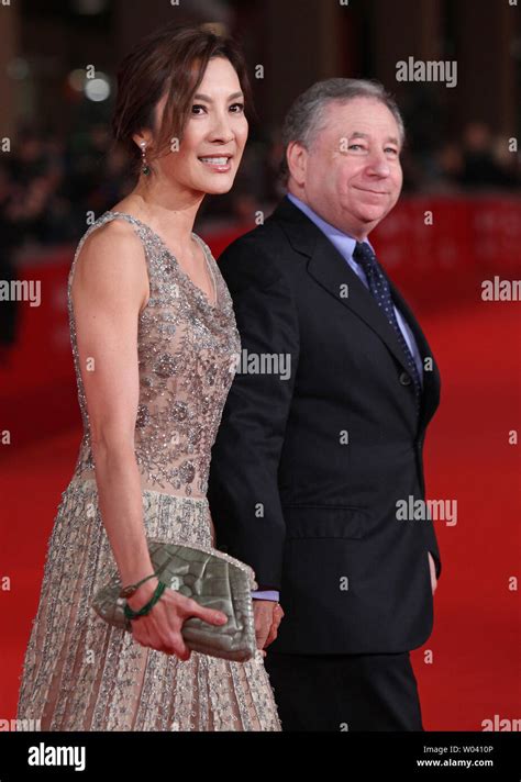 Michelle Yeoh and husband Jean Todt arrive on the red carpet before a ...