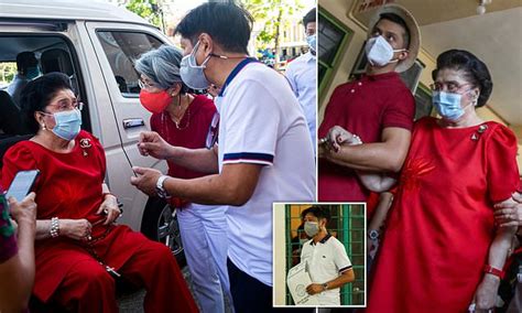 Imelda Marcos, 92, arrives to vote for son Bongbong as ex-dictator's heir is set to win ...