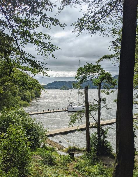 Lake Windermere with boat stock photo. Image of peaks - 197984770