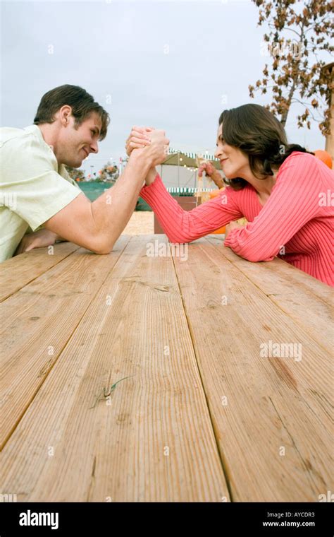 Husband wife arm wrestling hi-res stock photography and images - Alamy