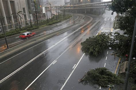 Super Typhoon Wrecks Buildings, Trees in Hong Kong