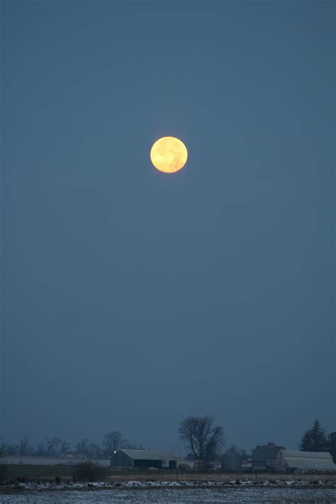 Full moon over a farm