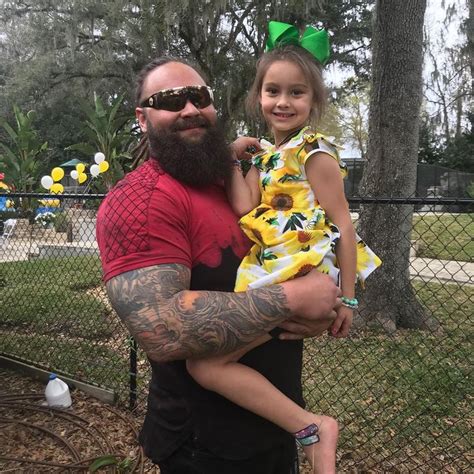 WWE Superstar Bray Wyatt (Windham Rotunda) holding his youngest ...