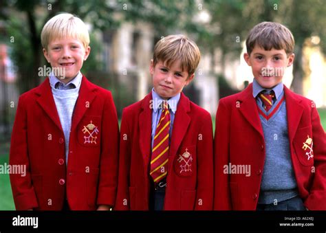 Horizontal shot of young boys age 6 and 8 in traditional school uniforms in York England Stock ...