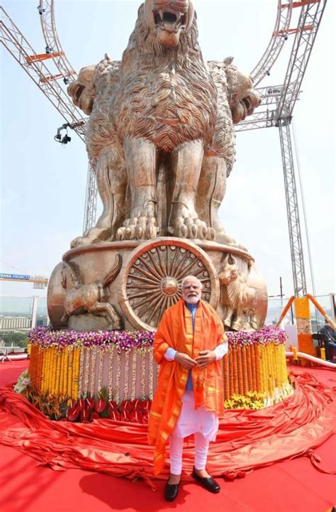 PM unveils national emblem on new Parliament building - Rediff.com India News