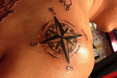 Man with Compass Tattoo