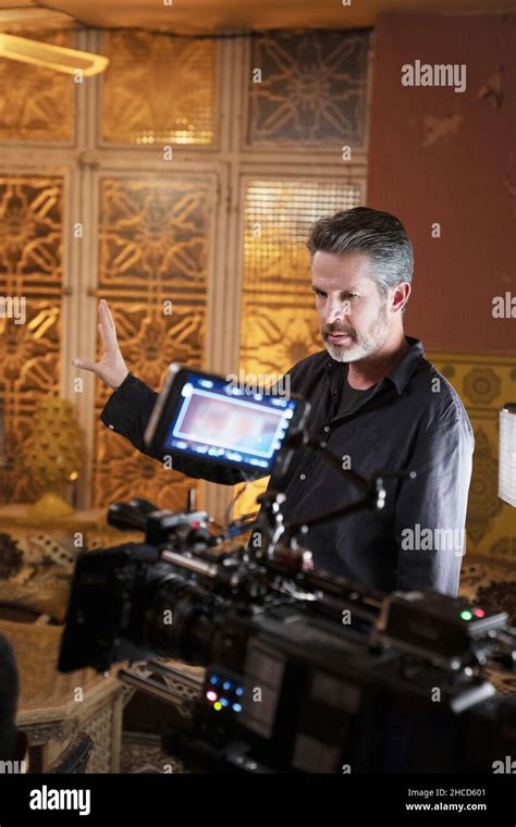 THE 355, director Simon Kinberg, on set, 2022. ph: Robert Viglasky / © Universal Pictures ...