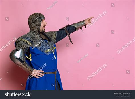 Medieval Knight Pointing Sword
