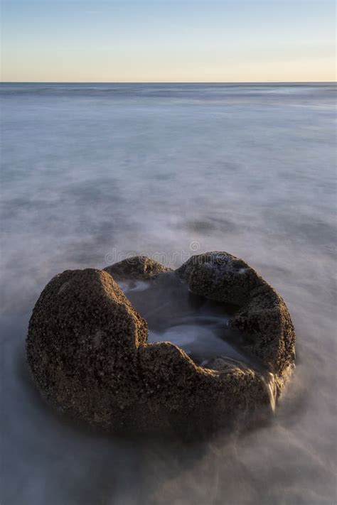 One of the Moeraki Boulders at Sunrise with a Colourful Sky, New ...