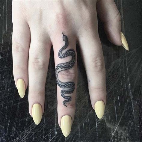 23 Bold and Badass Snake Tattoo Ideas for Women | StayGlam | Snake tattoo design, Finger tattoo ...